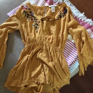 yellow romper never worn
